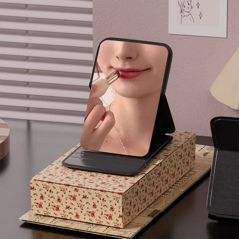 Woman MINI Folding Makeup Mirror High-quality Portable Pocket Makeup Mirror Single-side Creative Women Solid Color Handle Desk