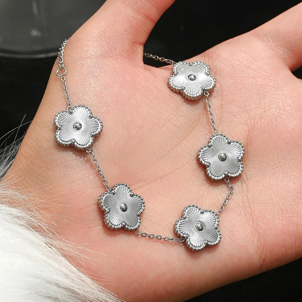 Europe And The United States Hot Stainless Steel Four-leaf Clover Lucky Bracelet Fashion Women's Nail Bracelet Gold Bangles