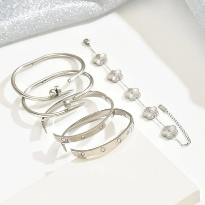 Europe And The United States Hot Stainless Steel Four-leaf Clover Lucky Bracelet Fashion Women's Nail Bracelet Gold Bangles
